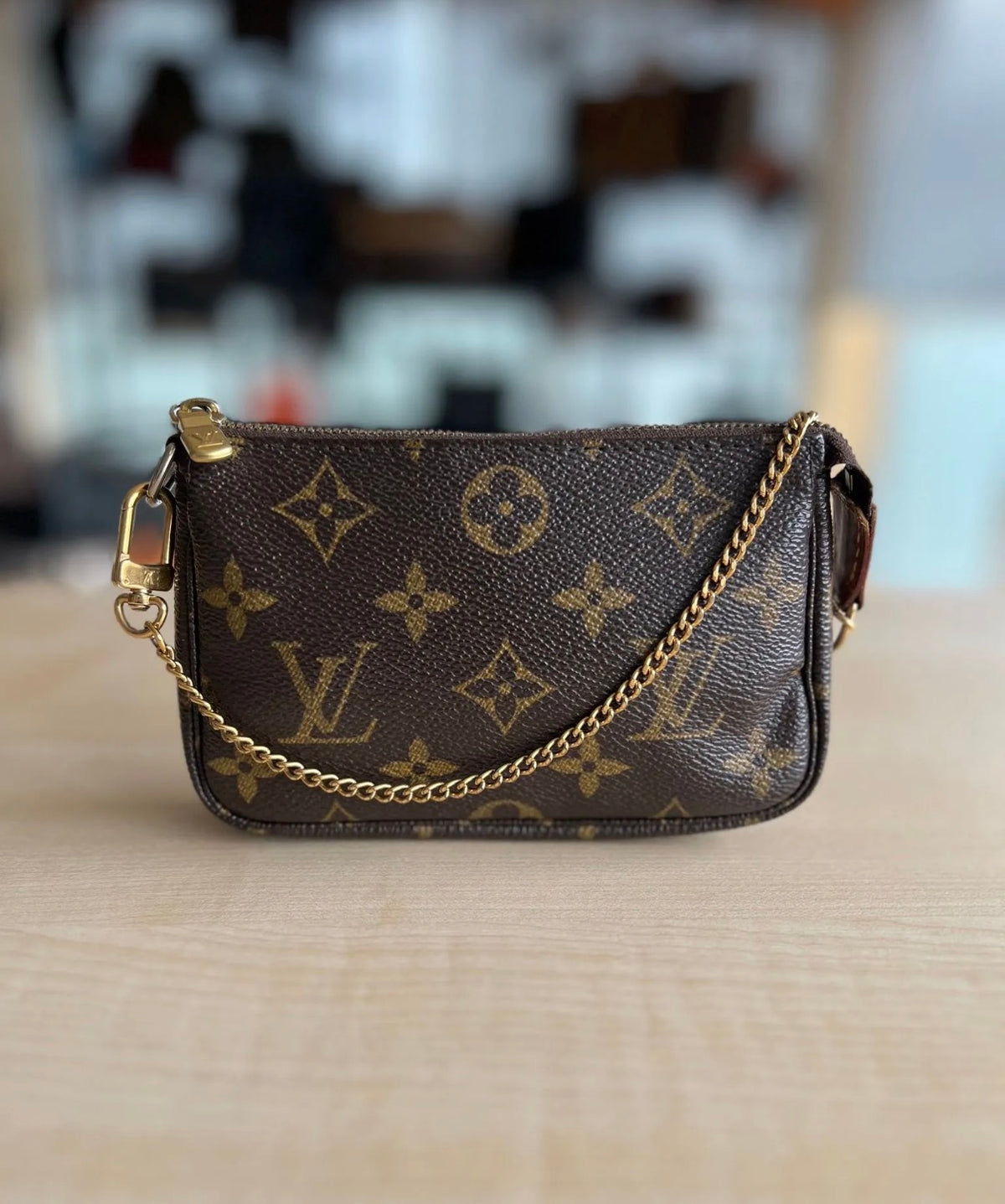 Louis Vuitton Pochette Mini Accessoires Monogram authentifiée — Le comptoir vintage