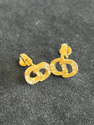 Christian Dior Boucles d'oreilles clip logo CD strass authentifiée — Le comptoir vintage