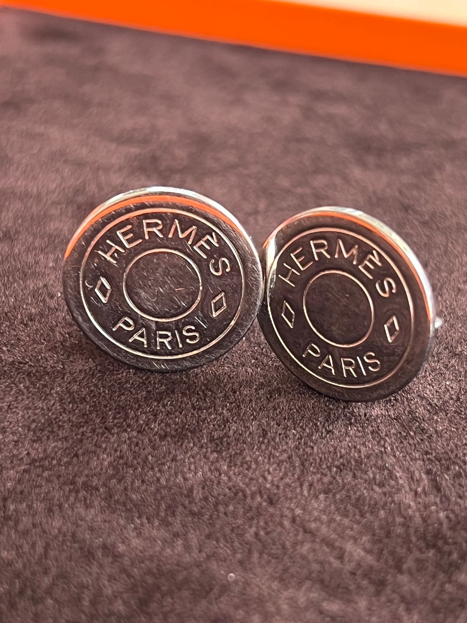 Hermès Boucles d'oreilles clips Serie Palladium authentifiée — Le comptoir vintage