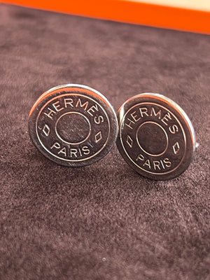 Hermès Boucles d'oreilles clips Serie Palladium authentifiée — Le comptoir vintage