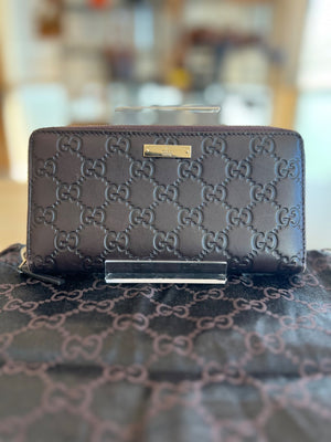 Gucci Portefeuille long zippé Guccissima authentifié — Le comptoir vintage
