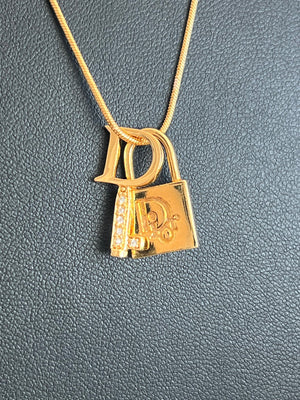 Dior Collier pendentif cadenas et clé logo Dior strass, métal doré — vue 3 | Le comptoir vintage