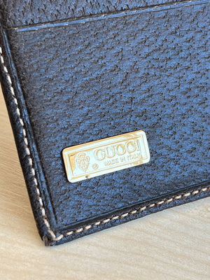 Gucci Portefeuille long en cuir grainé marron avec logo GG — vue 7 | Le comptoir vintage