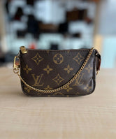 Louis Vuitton Pochette Mini Accessoires Monogram authentifiée — Le comptoir vintage