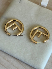Boucles d'oreilles Fendi F's authentifiées — Le Comptoir Vintage