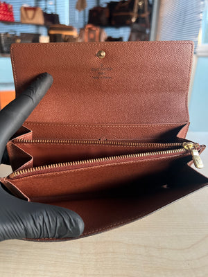 Portefeuille Louis Vuitton Sarah Monogram authentifié — Le Comptoir Vintage