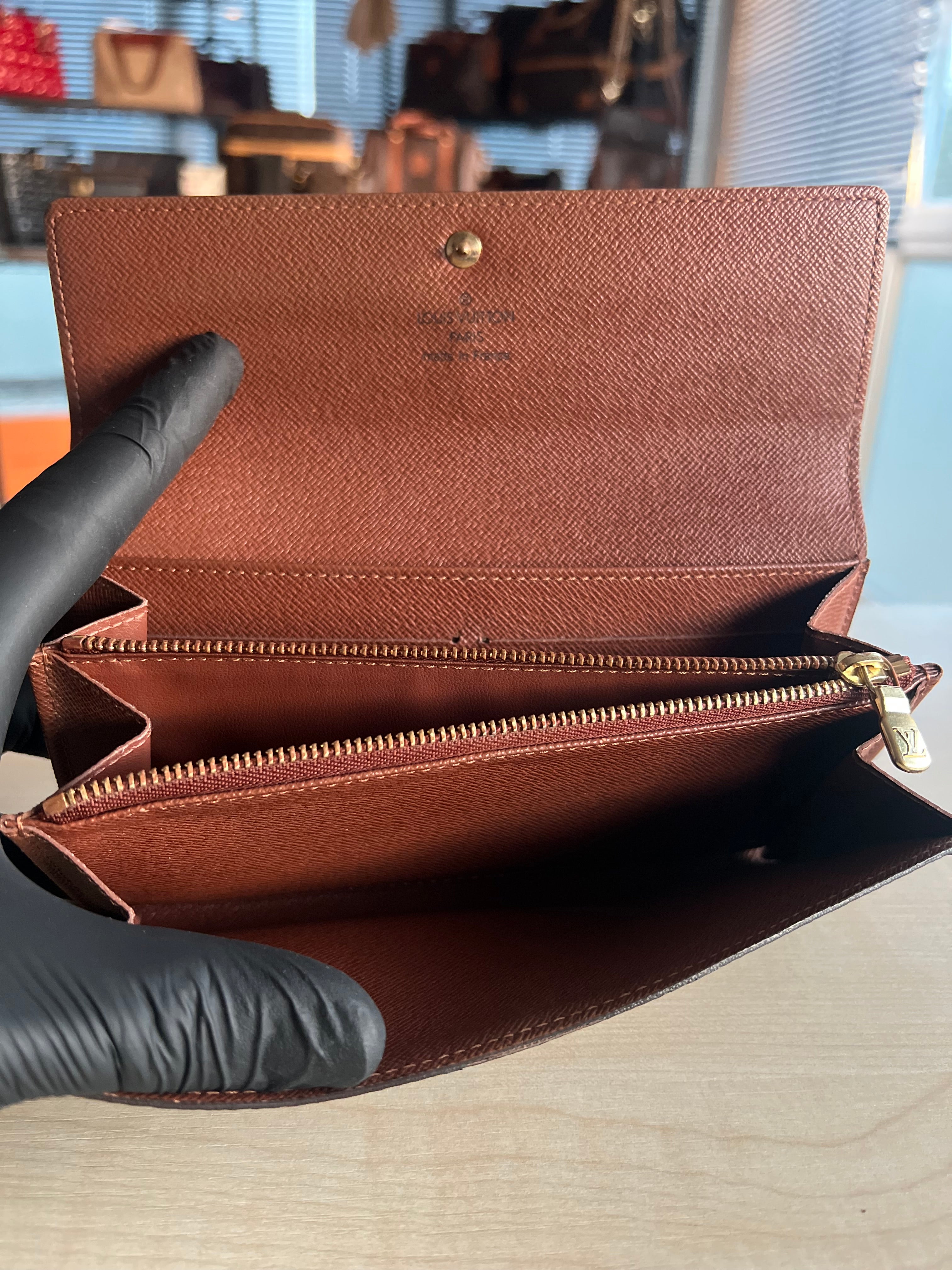 Portefeuille Louis Vuitton Sarah Monogram authentifié — Le Comptoir Vintage