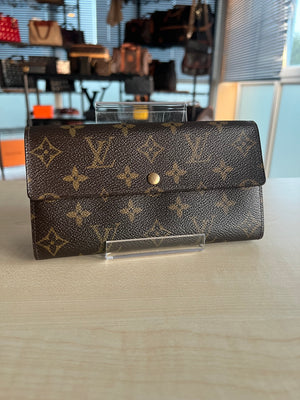 Portefeuille Louis Vuitton Sarah Monogram authentifié — Le Comptoir Vintage
