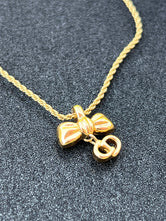 Collier Christian Dior plaqué or authentifié — Le Comptoir Vintage