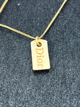 Collier Christian Dior plaqué or authentifié — Le Comptoir Vintage