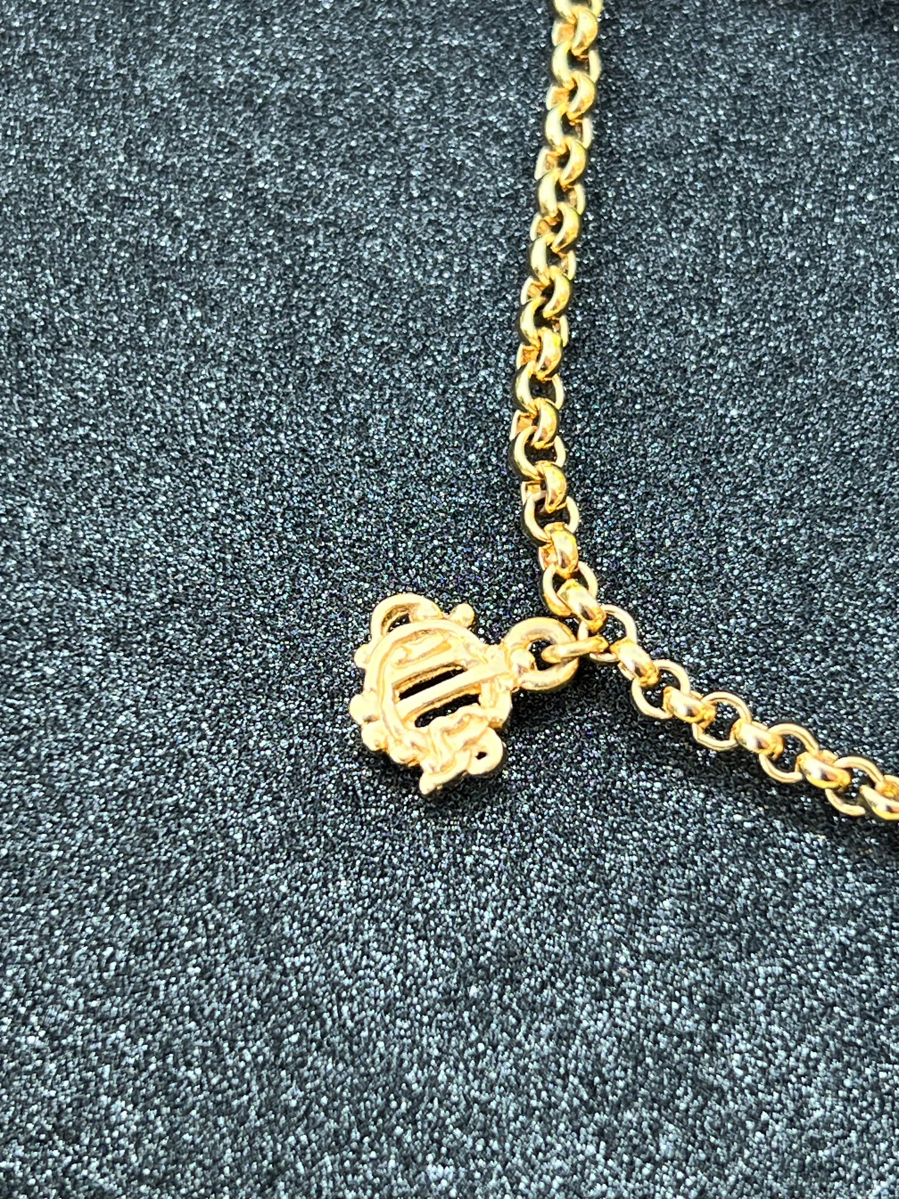 Bracelet Dior plaqué or authentifié — Le Comptoir Vintage