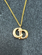 Collier Dior CD plaqué or authentifié — Le Comptoir Vintage