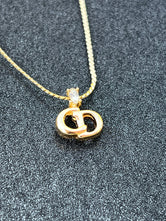 Collier Dior CD plaqué or authentifié — Le Comptoir Vintage