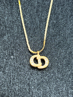 Dior collier CD plaqué or  — vue 2 | Le comptoir vintage