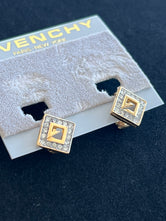 Boucles d'oreilles Givenchy clip carrées logo G authentifiées — Le Comptoir Vintage