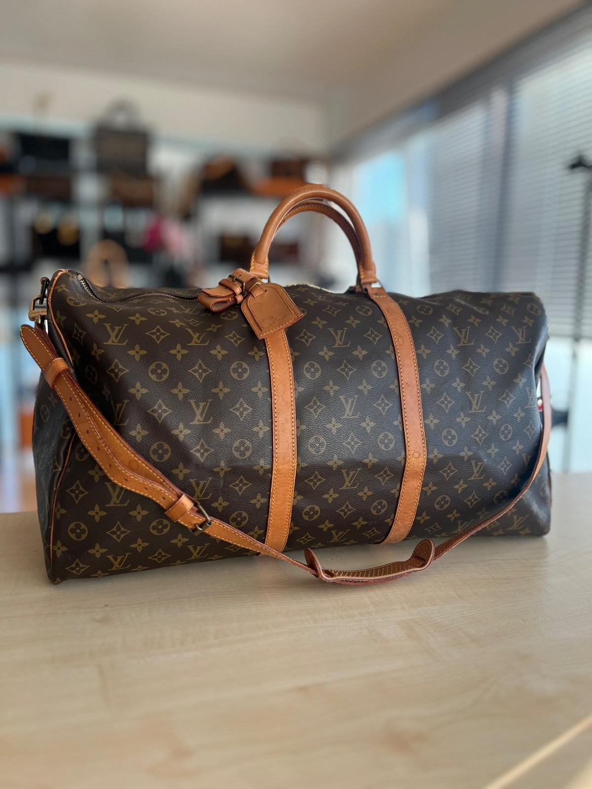 Sac de voyage Louis Vuitton Keepall Bandoulière 60 authentifiée — Le comptoir vintage