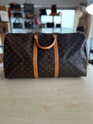 Sac de voyage Louis Vuitton Keepall Bandoulière 55 — vue 2 | Le comptoir vintage
