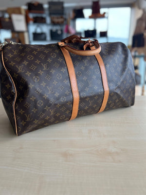 Sac de voyage Louis Vuitton Keepall Bandoulière 55 authentifiée — Le comptoir vintage